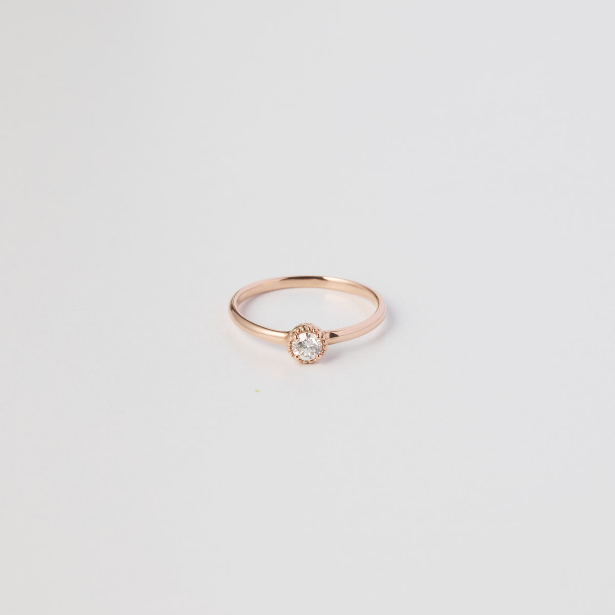 K18 single diamond pinky ring 
